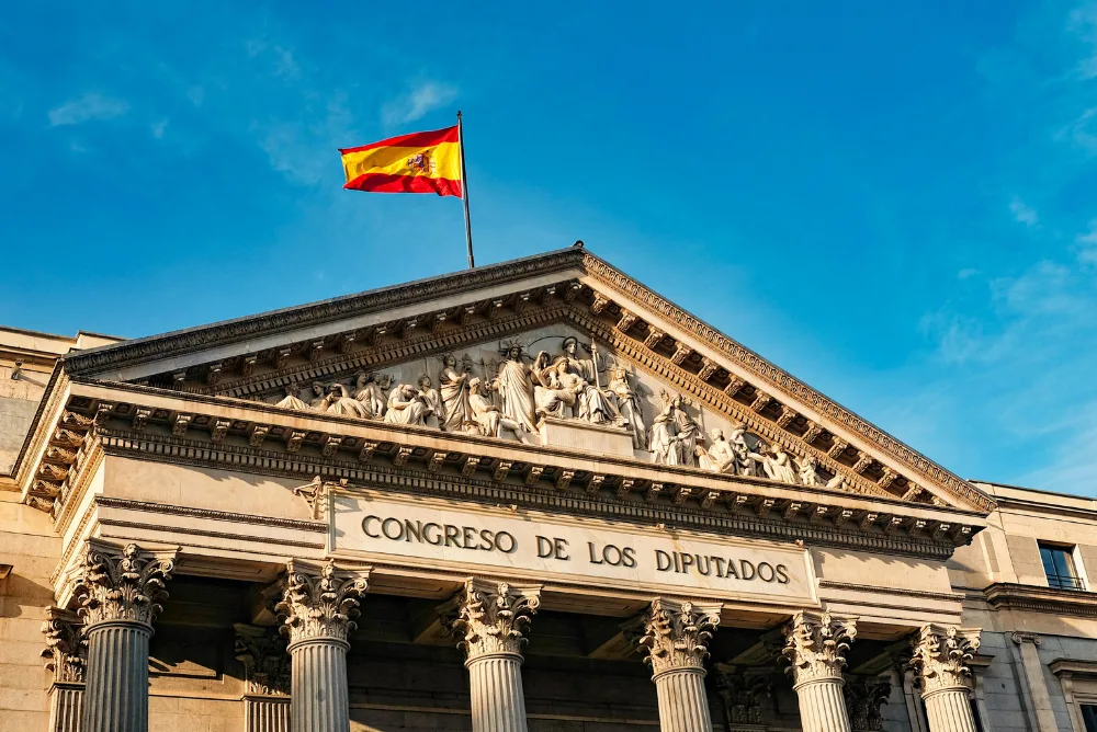 The Spanish flag flying over the Congress of Deputies in Madrid