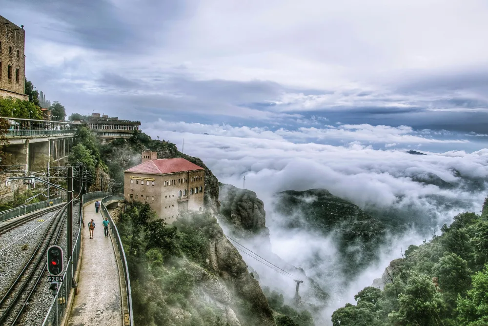 A mountain path in northern Spain running above a sea of low cloud